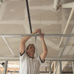 Installing a Drywall suspension ceiling grid system